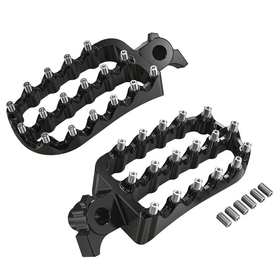 Black metal foot pegs with studs on a white background